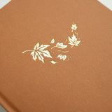 Swirling Leaves Dot Grid Notebook